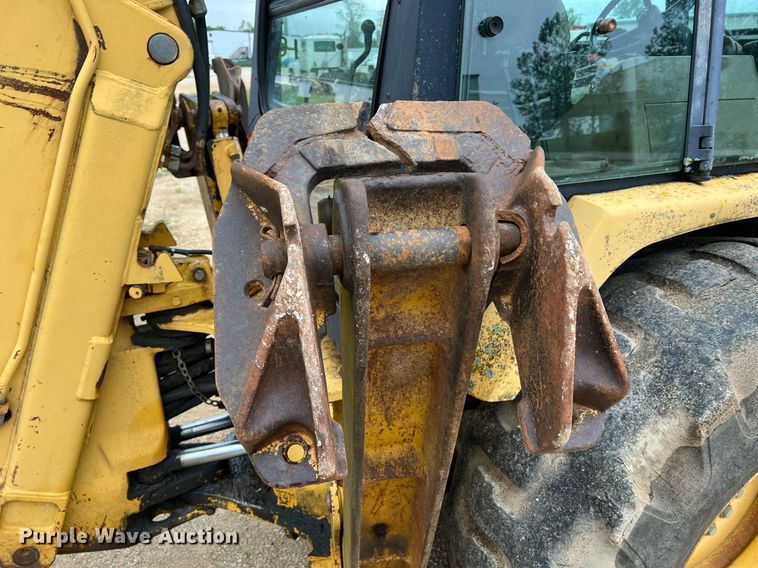 image for item LI9735 1996 John Deere 710D  backhoe
