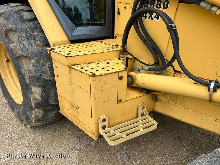 image for item LI9735 1996 John Deere 710D  backhoe