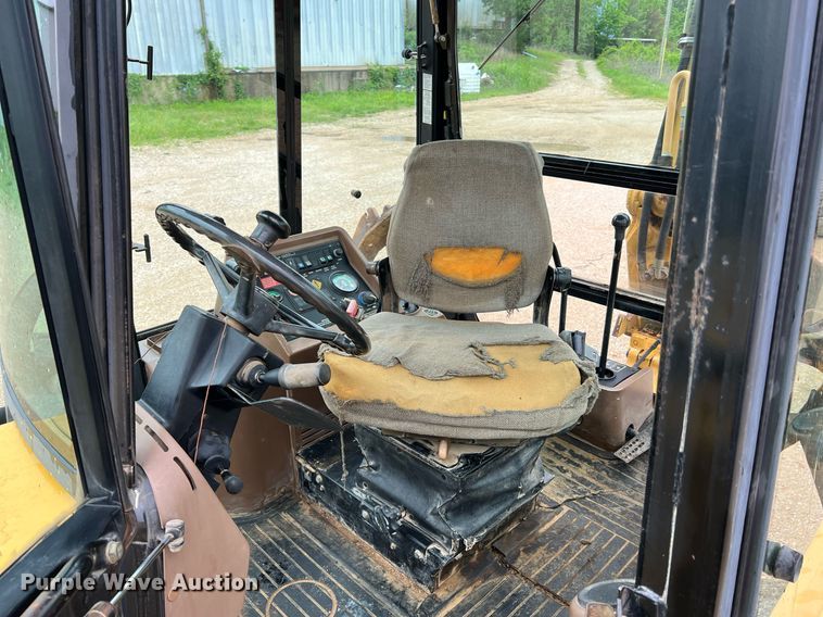 image for item LI9735 1996 John Deere 710D  backhoe