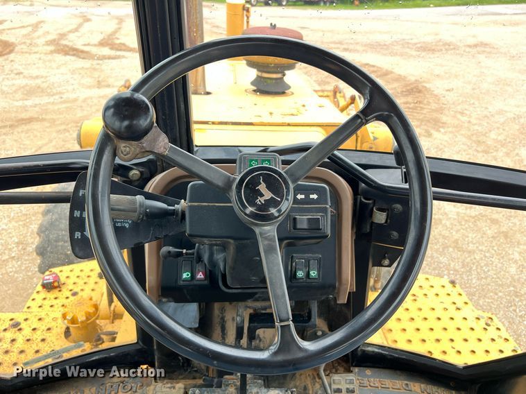 image for item LI9735 1996 John Deere 710D  backhoe