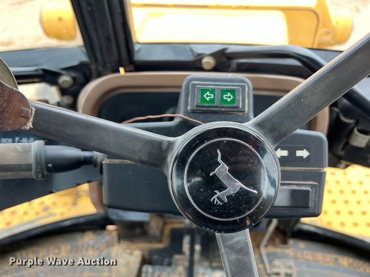 image for item LI9735 1996 John Deere 710D  backhoe