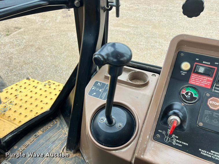 image for item LI9735 1996 John Deere 710D  backhoe