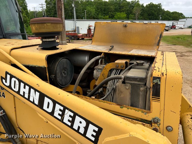 image for item LI9735 1996 John Deere 710D  backhoe