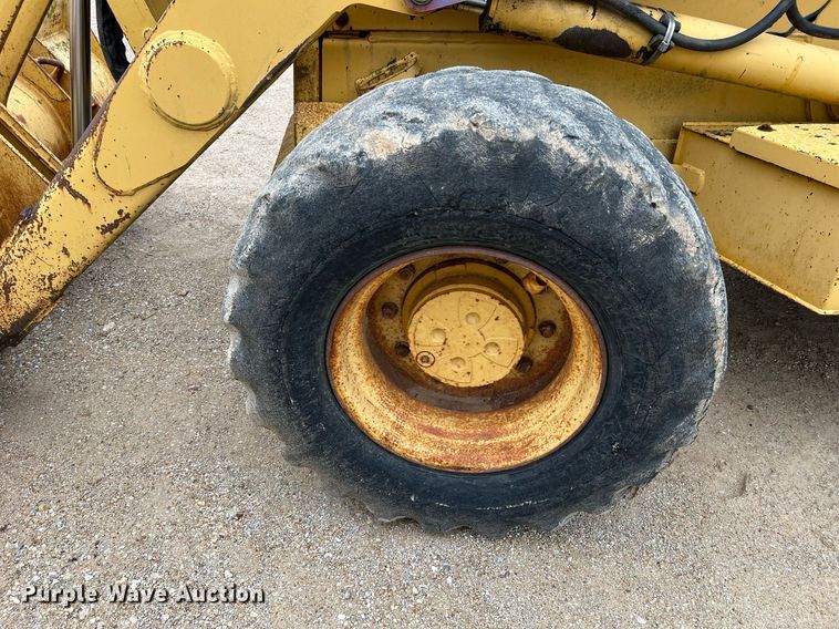 image for item LI9735 1996 John Deere 710D  backhoe