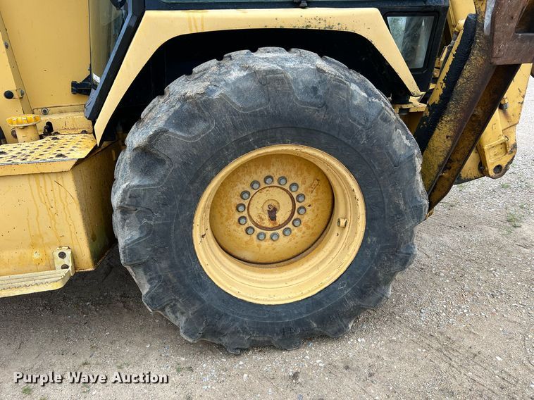 image for item LI9735 1996 John Deere 710D  backhoe