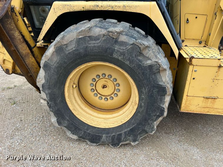 image for item LI9735 1996 John Deere 710D  backhoe