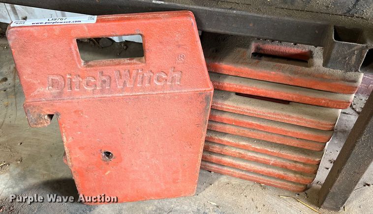 image for item LI9767 (10) Ditch Witch 100 lbs suitcase weights