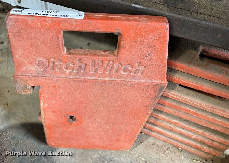 image for item LI9767 (10) Ditch Witch 100 lbs suitcase weights