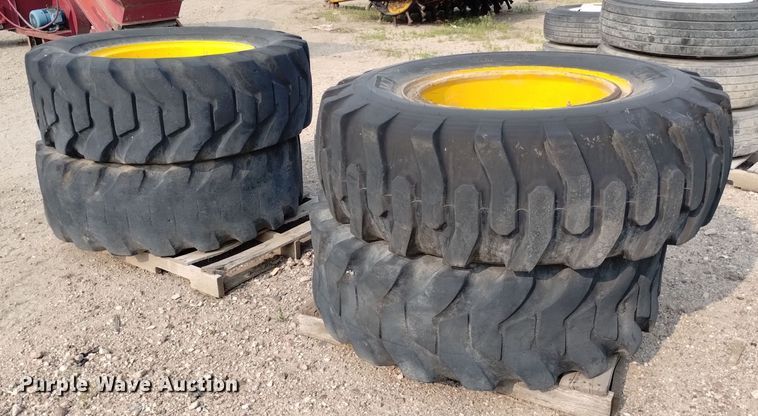 image for item LP9616 (4) 15.5-25 tires and wheels