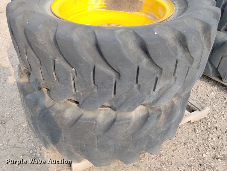 image for item LP9616 (4) 15.5-25 tires and wheels