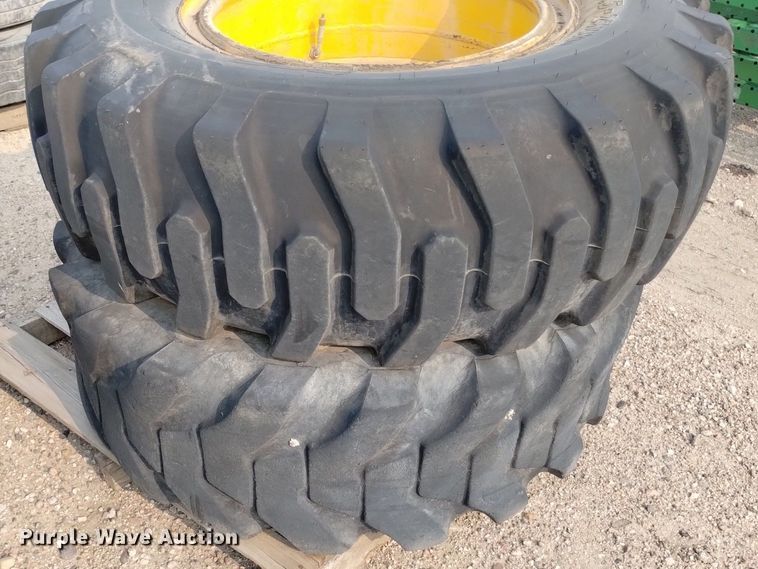 image for item LP9616 (4) 15.5-25 tires and wheels