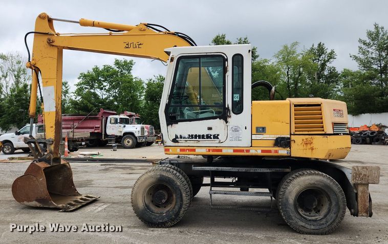 image for item LX9591 Liebherr A312  wheeled excavator