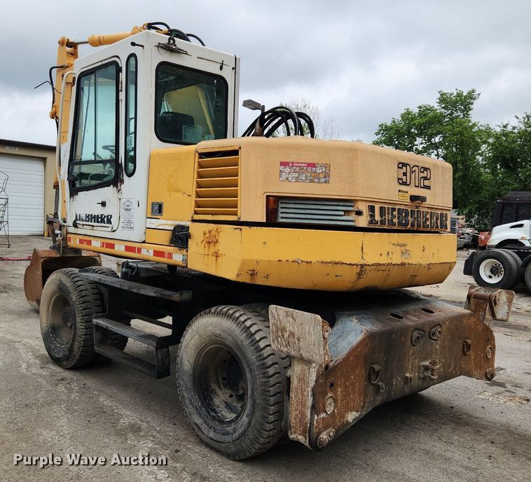 image for item LX9591 Liebherr A312  wheeled excavator