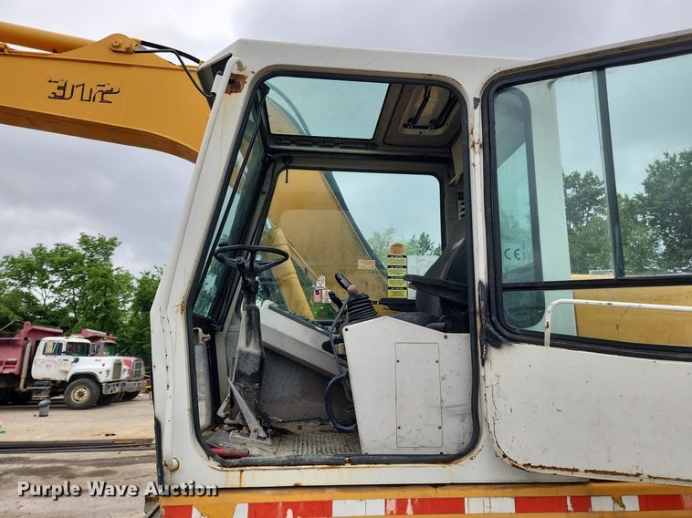 image for item LX9591 Liebherr A312  wheeled excavator