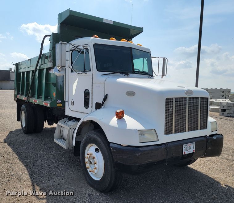 image for item ML9415 1999 Peterbilt 330  dump truck