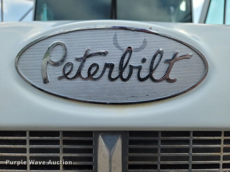 image for item ML9415 1999 Peterbilt 330  dump truck