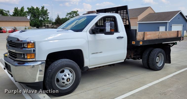 image for item DK1859 2017 Chevrolet Silverado 3500HD  dump flatbed pickup truck