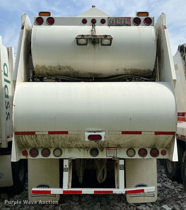 image for item II9047 2009 Crane Carrier Low Entry  refuse truck