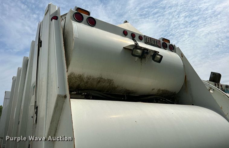 image for item II9047 2009 Crane Carrier Low Entry  refuse truck