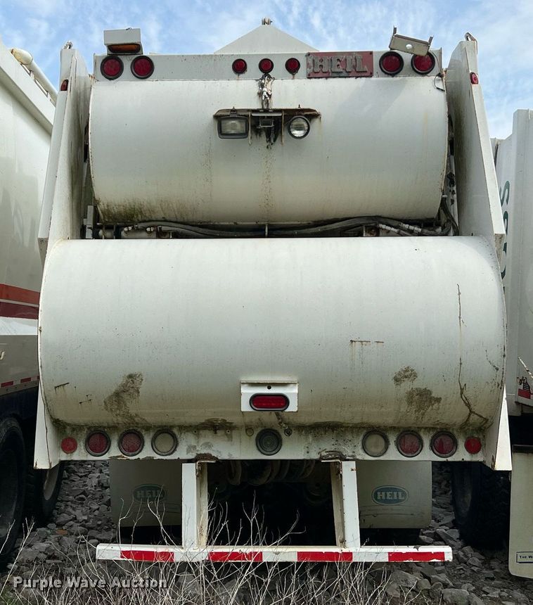 image for item II9048 2009 Crane Carrier Low Entry  refuse truck