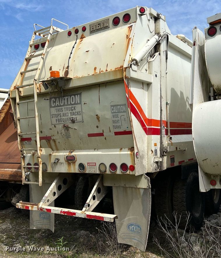 image for item II9049 2013 Crane Carrier Low Entry  refuse truck