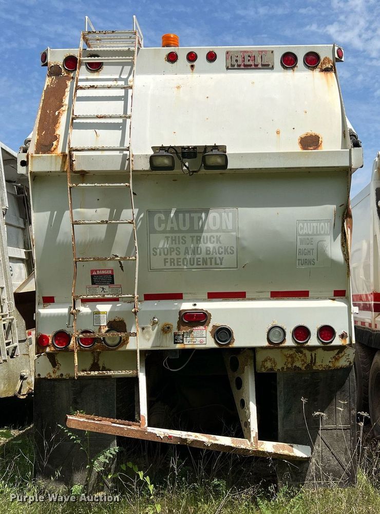 image for item II9054 2009 Crane Carrier Low Entry  refuse truck