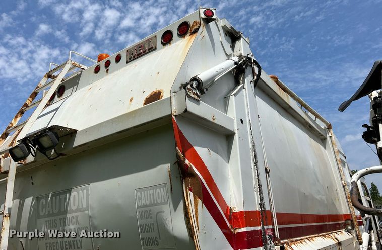 image for item II9054 2009 Crane Carrier Low Entry  refuse truck