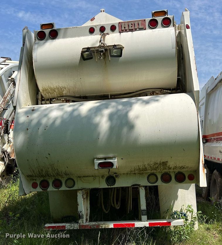 image for item II9055 2009 Crane Carrier Low Entry  refuse truck