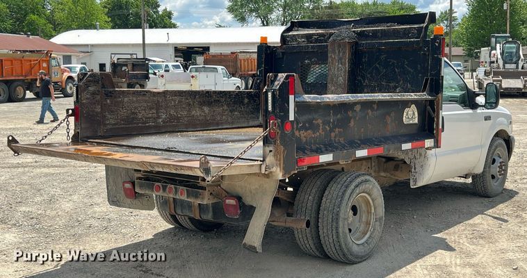 image for item LG9205 1999 Ford F350 Super Duty  dump flatbed pickup truck