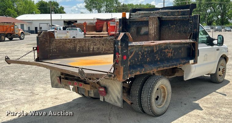 image for item LG9218 1999 Ford F350 Super Duty  dump flatbed pickup truck