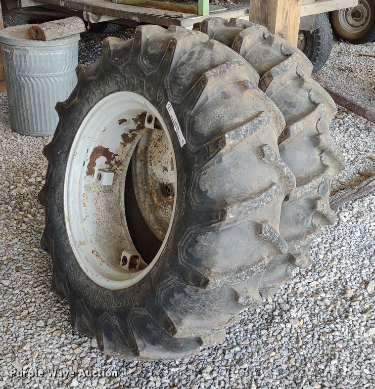 image for item LL9176 (2) 12.4-24 Firestone wheels and tires