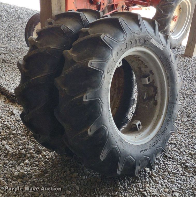 image for item LL9176 (2) 12.4-24 Firestone wheels and tires