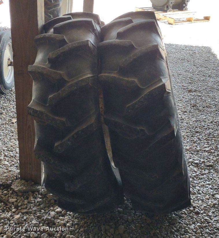 image for item LL9176 (2) 12.4-24 Firestone wheels and tires