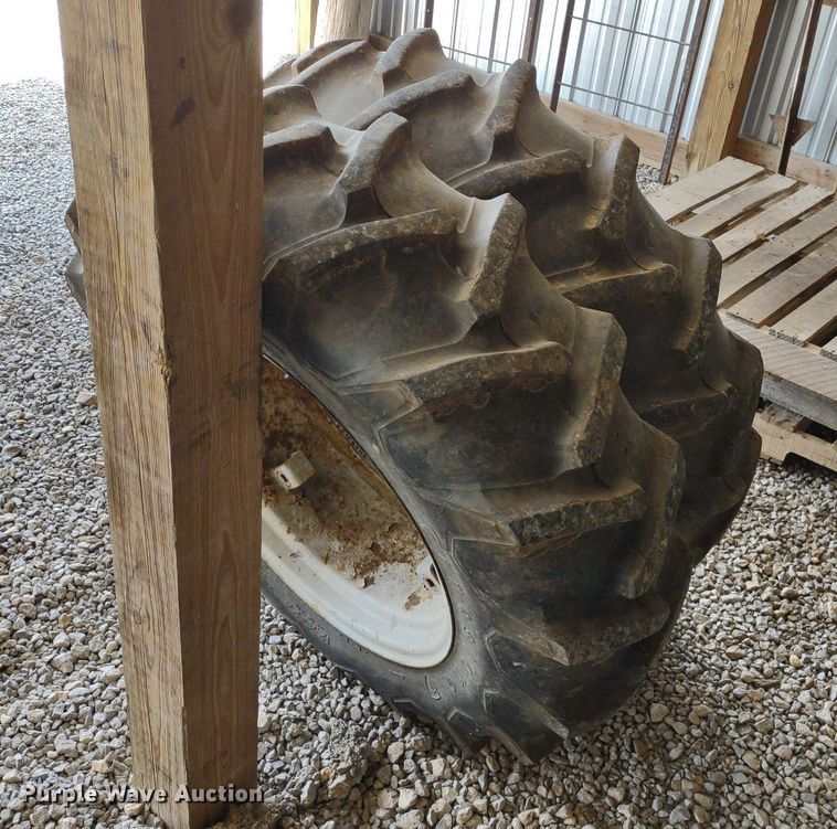 image for item LL9176 (2) 12.4-24 Firestone wheels and tires