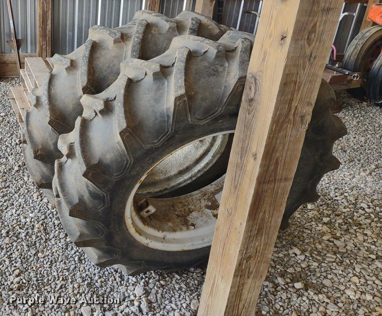 image for item LL9176 (2) 12.4-24 Firestone wheels and tires