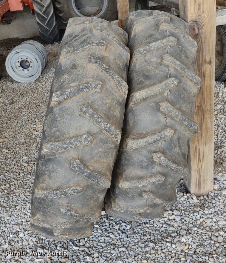 image for item LL9176 (2) 12.4-24 Firestone wheels and tires