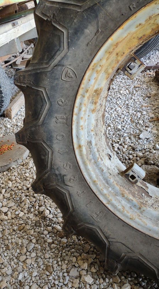 image for item LL9176 (2) 12.4-24 Firestone wheels and tires