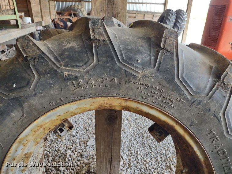 image for item LL9176 (2) 12.4-24 Firestone wheels and tires