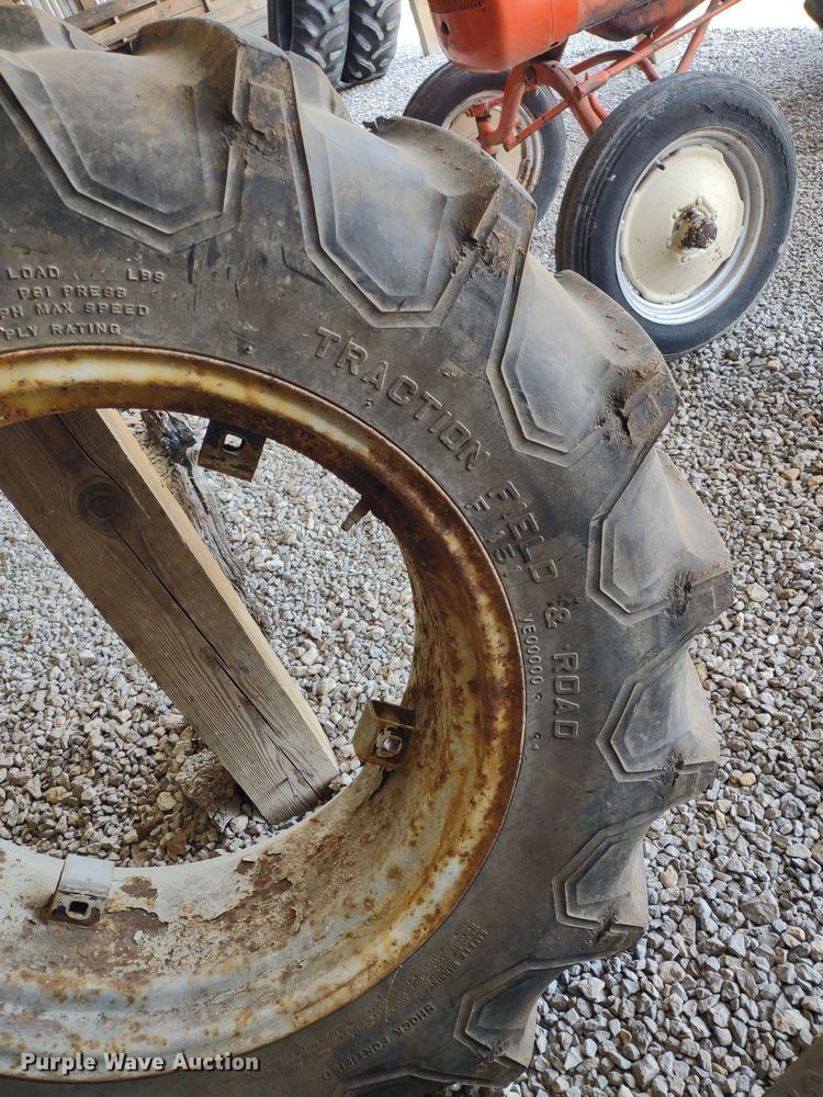 image for item LL9176 (2) 12.4-24 Firestone wheels and tires