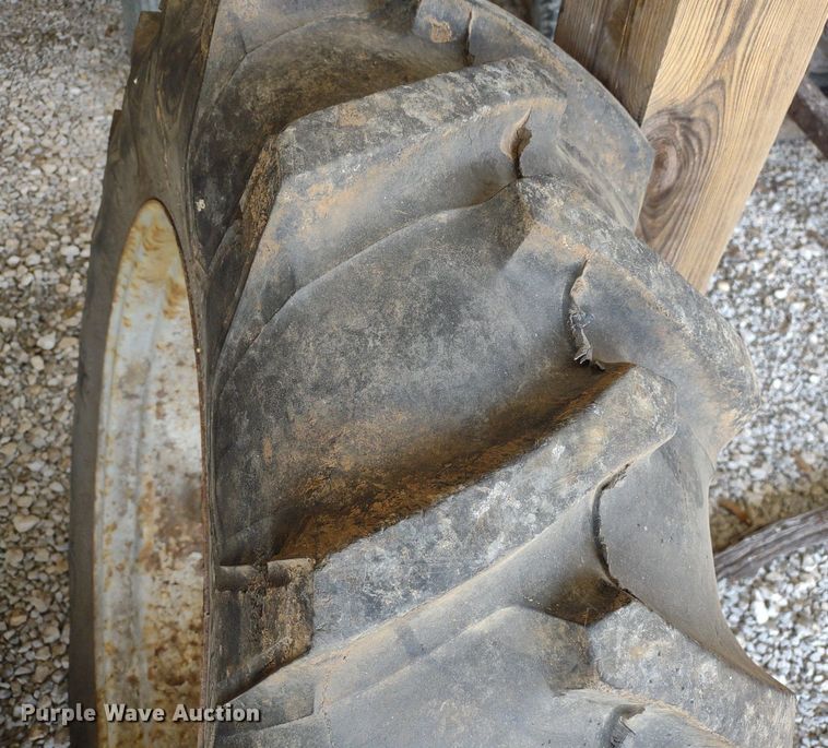 image for item LL9176 (2) 12.4-24 Firestone wheels and tires