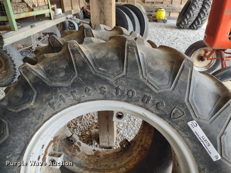 image for item LL9176 (2) 12.4-24 Firestone wheels and tires