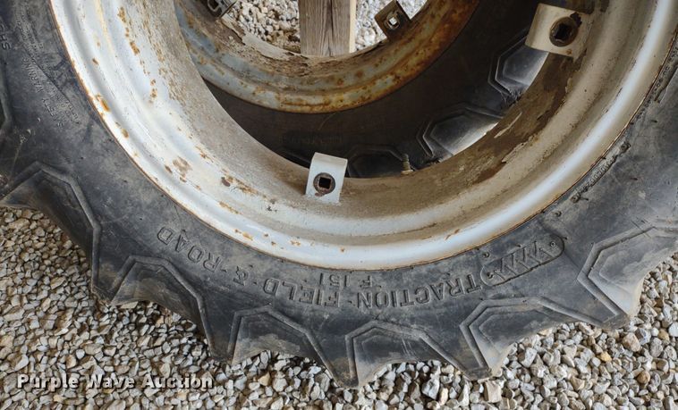 image for item LL9176 (2) 12.4-24 Firestone wheels and tires