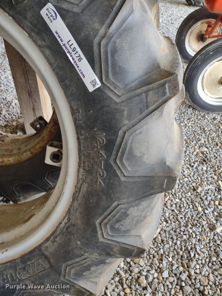 image for item LL9176 (2) 12.4-24 Firestone wheels and tires