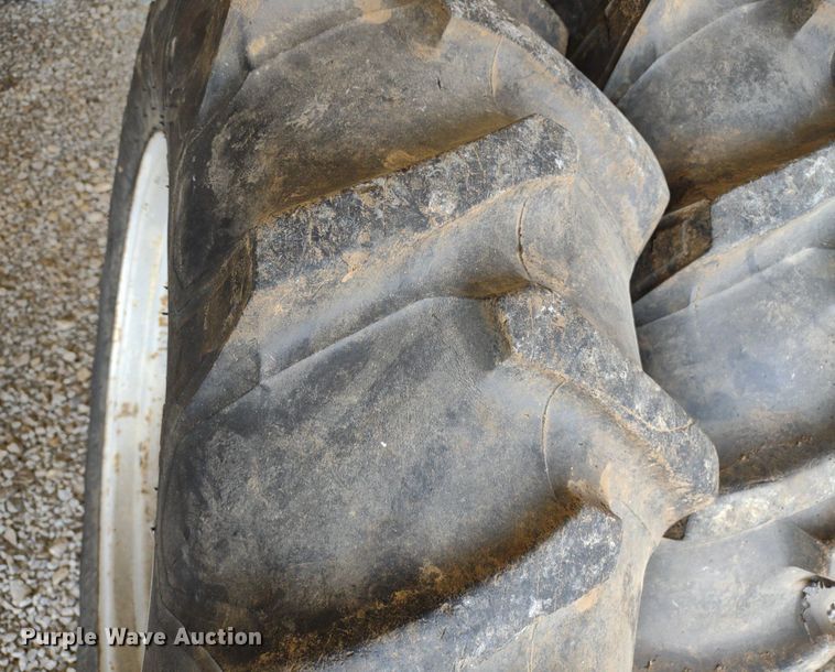 image for item LL9176 (2) 12.4-24 Firestone wheels and tires