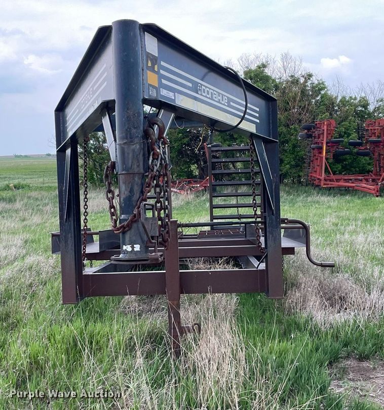 image for item LY9721 2000 Donahue EXG-150  swather / windrower trailer with hay rake