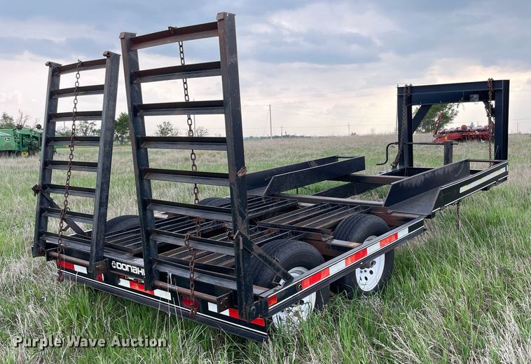 image for item LY9721 2000 Donahue EXG-150  swather / windrower trailer with hay rake