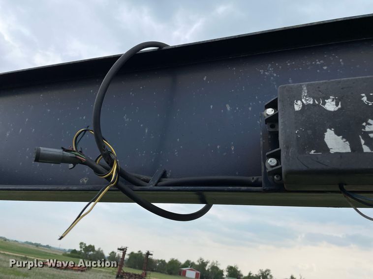 image for item LY9721 2000 Donahue EXG-150  swather / windrower trailer with hay rake