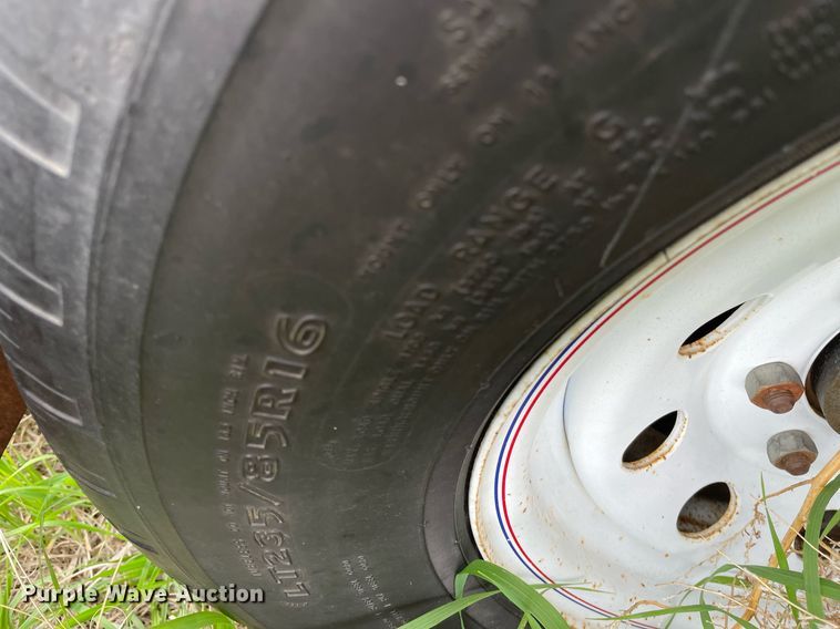 image for item LY9721 2000 Donahue EXG-150  swather / windrower trailer with hay rake