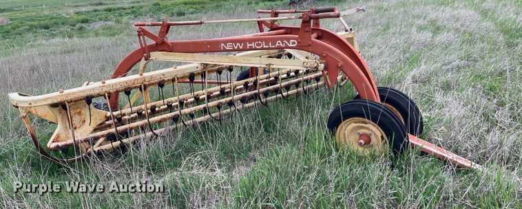 image for item LY9721 2000 Donahue EXG-150  swather / windrower trailer with hay rake