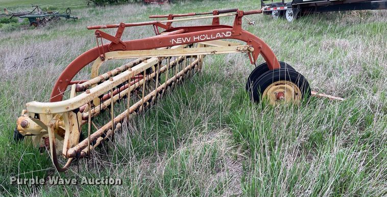 image for item LY9721 2000 Donahue EXG-150  swather / windrower trailer with hay rake